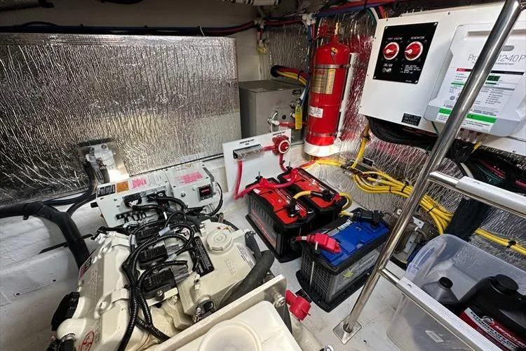  Yacht Photos Pics Engine room of 2019 Cruisers Yachts 390 Express Coupe with equipment and wiring.