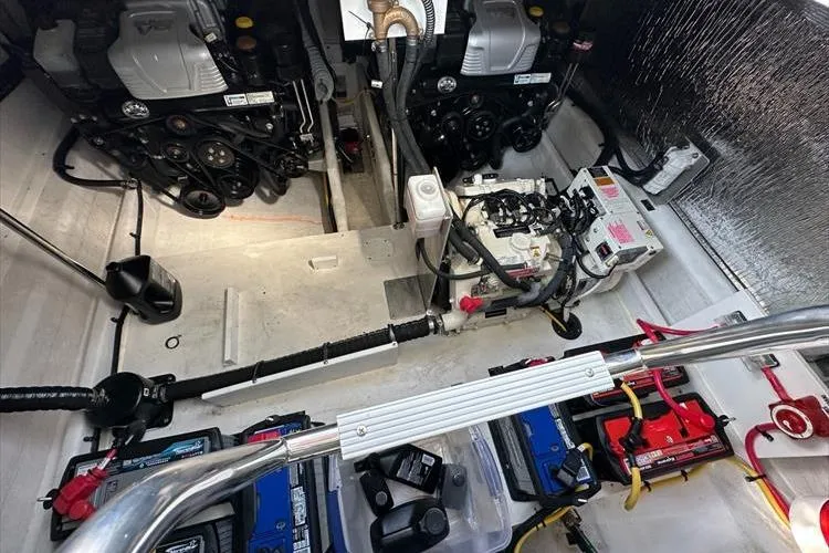  Yacht Photos Pics Engine room of 2019 Cruisers Yachts 390 Express Coupe with visible components and wiring.