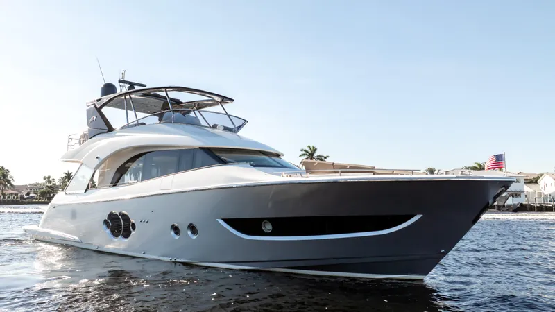 Classy Lady IV Yacht Photos Pics 2020 Monte Carlo Yachts MCY 66 luxury yacht cruising on calm waters.