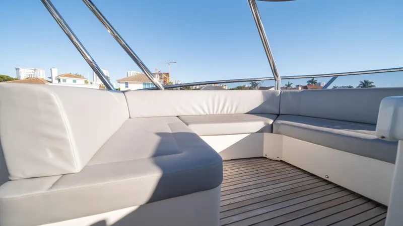 Classy Lady IV Yacht Photos Pics Luxurious seating area on 2020 Monte Carlo Yachts MCY 66 with sleek design.