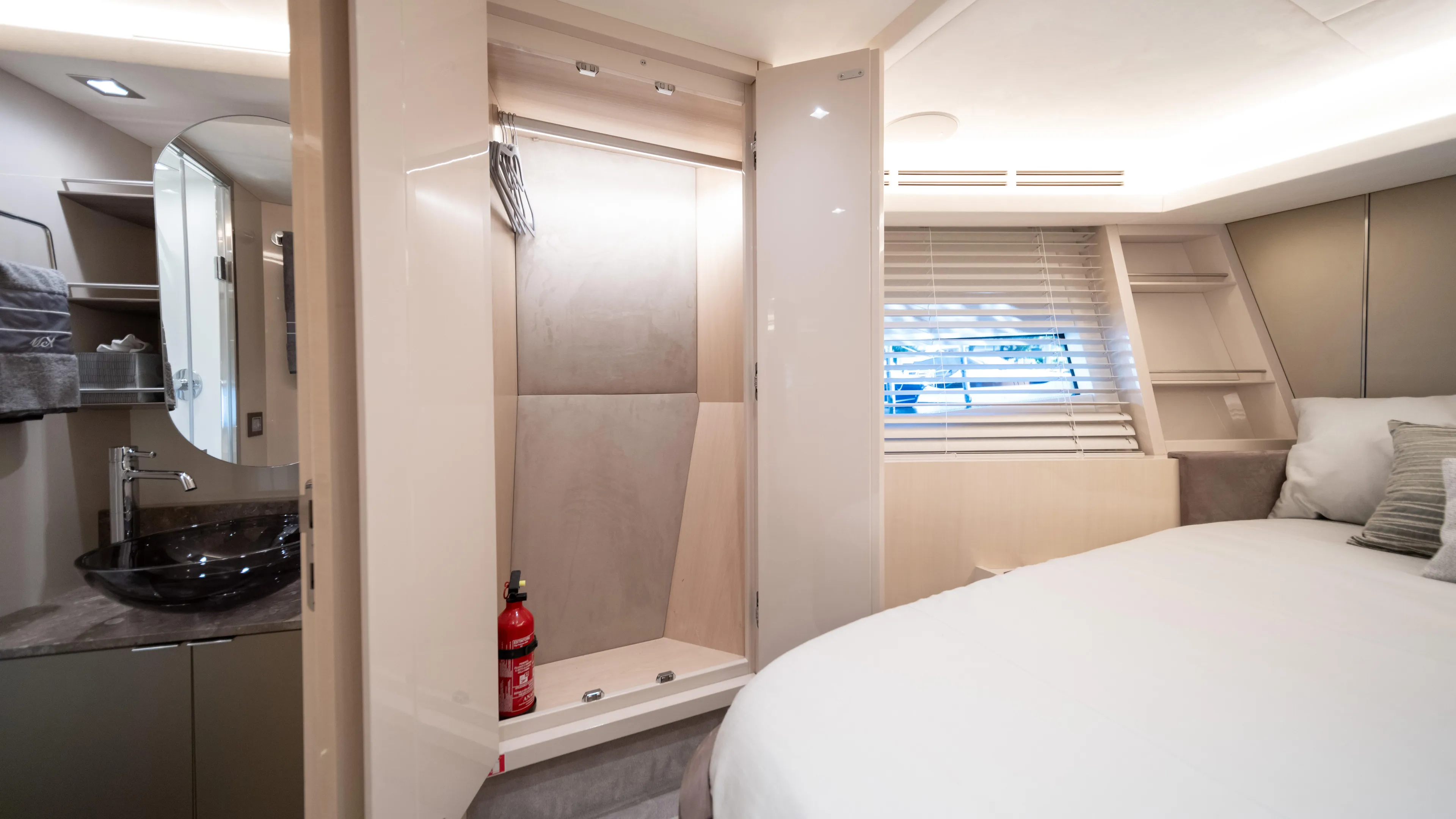 Classy Lady IV Yacht Photos Pics Luxurious interior of 2020 Monte Carlo Yachts MCY 66 with modern bathroom and cozy bedroom.