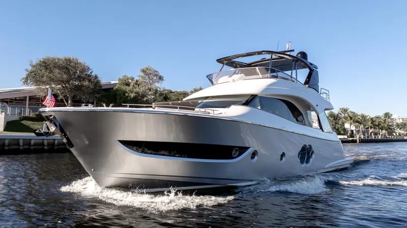 Classy Lady IV Yacht Photos Pics 2020 Monte Carlo Yachts MCY 66 cruising on a sunny day.