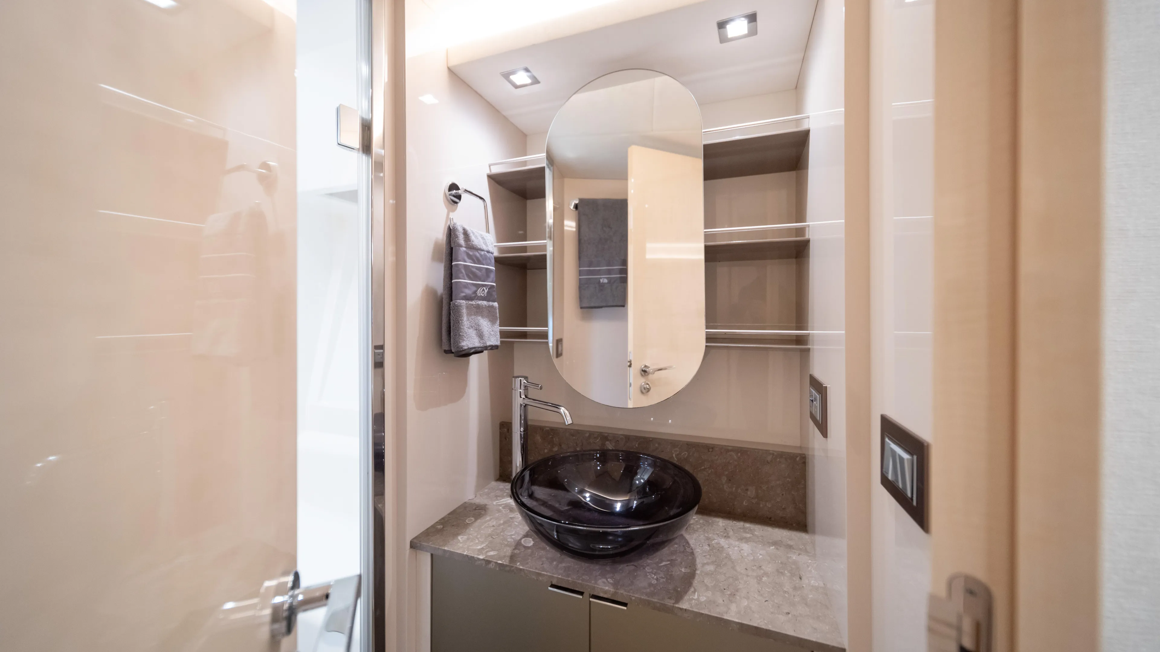 Classy Lady IV Yacht Photos Pics Luxurious bathroom in 2020 Monte Carlo Yachts MCY 66, featuring modern sink and elegant design.