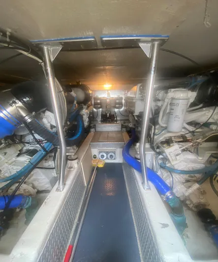  Yacht Photos Pics Engine room of a 2003 Ocean Yachts 48 Super Sport with visible machinery.