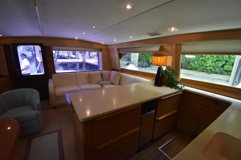  Yacht Photos Pics Interior of 2003 Ocean Yachts 48 Super Sport with modern furnishings and ample natural light.