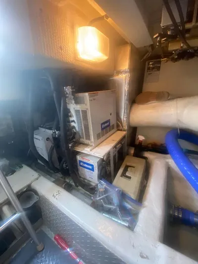  Yacht Photos Pics Engine room of a 2003 Ocean Yachts 48 Super Sport with mechanical equipment.