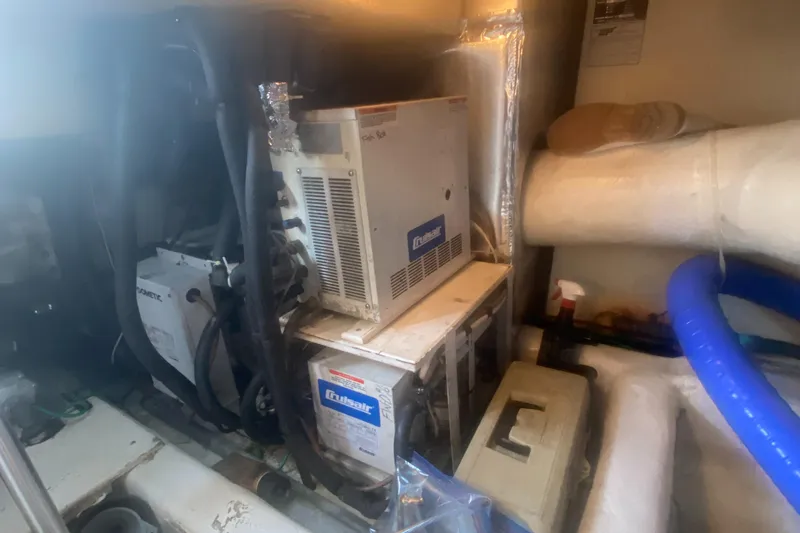  Yacht Photos Pics Engine room of a 2003 Ocean Yachts 48 Super Sport with machinery and equipment.