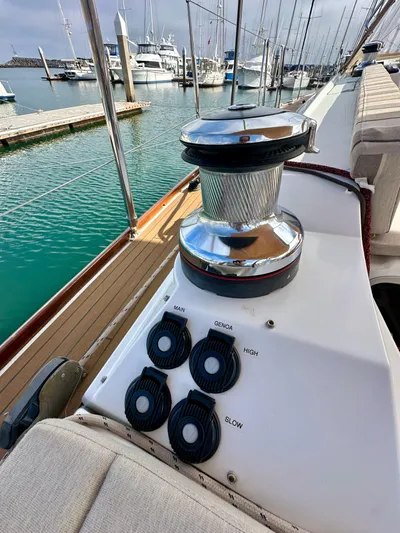 Stella Maris Yacht Photos Pics Jeanneau 57 sailboat deck with winch and control buttons, docked at marina, 2014 model.