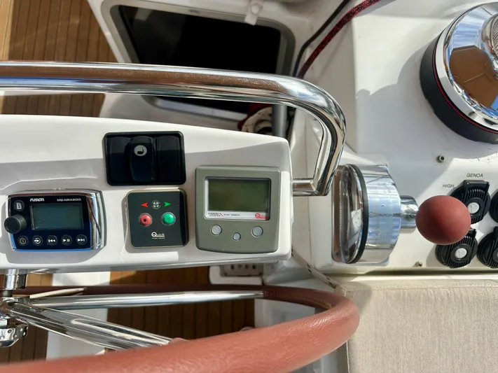 Stella Maris Yacht Photos Pics Control panel of a 2014 Jeanneau 57 yacht with navigation instruments.