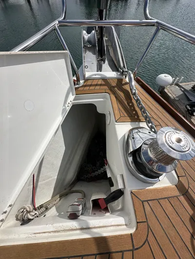 Stella Maris Yacht Photos Pics 2014 Jeanneau 57 yacht deck with open storage compartment and winch.