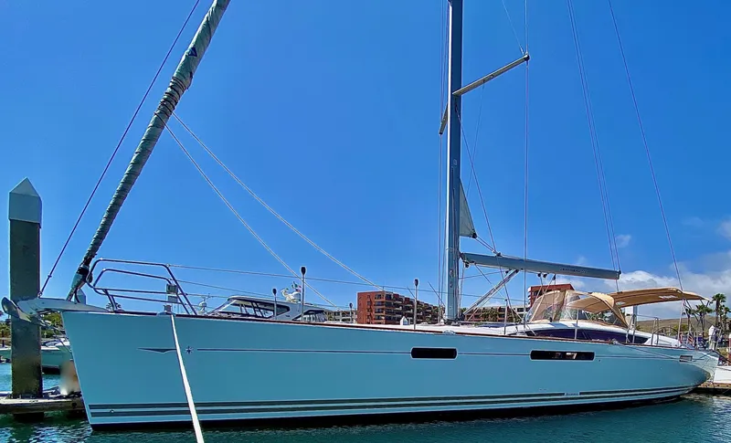 Stella Maris Yacht Photos Pics 2014 Jeanneau 57 sailboat docked in marina under clear blue sky.