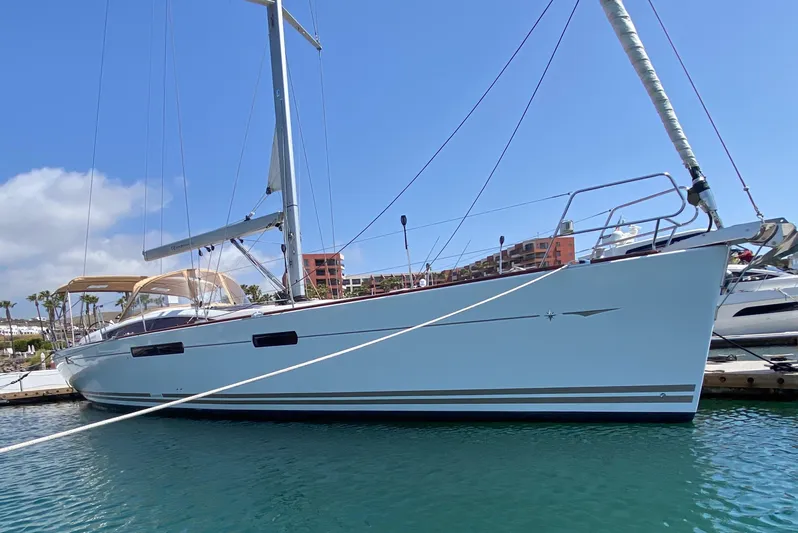 Stella Maris Yacht Photos Pics 2014 Jeanneau 57 yacht docked in marina under clear blue sky.