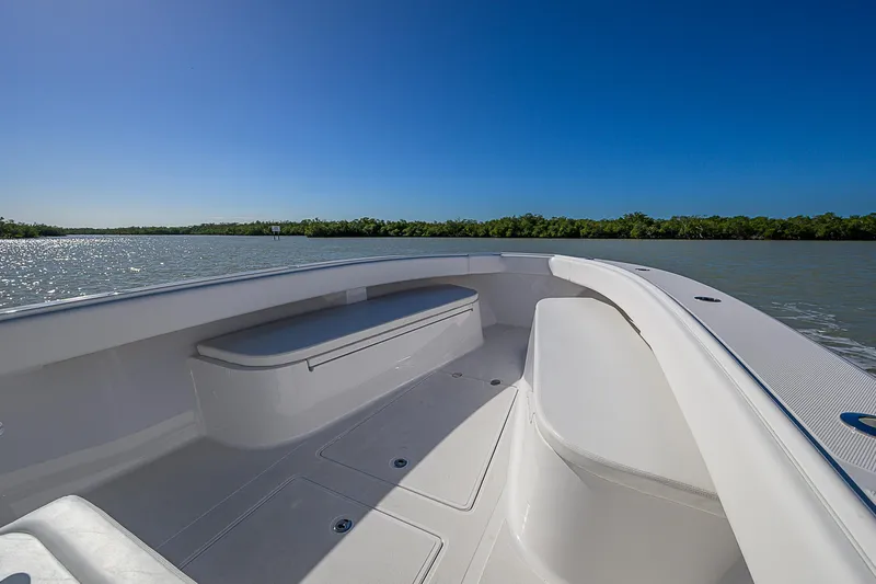 Grand Slam Yacht Photos Pics 2017 Bahama 41 boat on calm water, clear sky, spacious deck view.