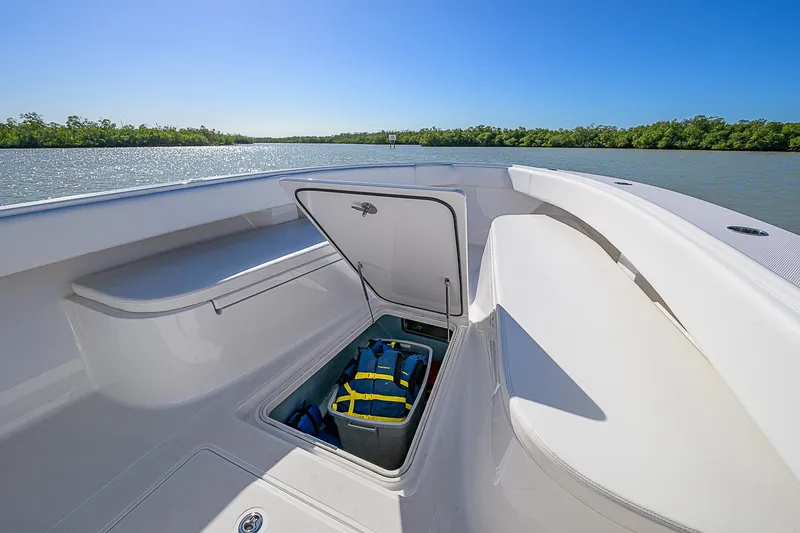 Grand Slam Yacht Photos Pics 2017 Bahama 41 boat with open storage compartment, scenic water view.