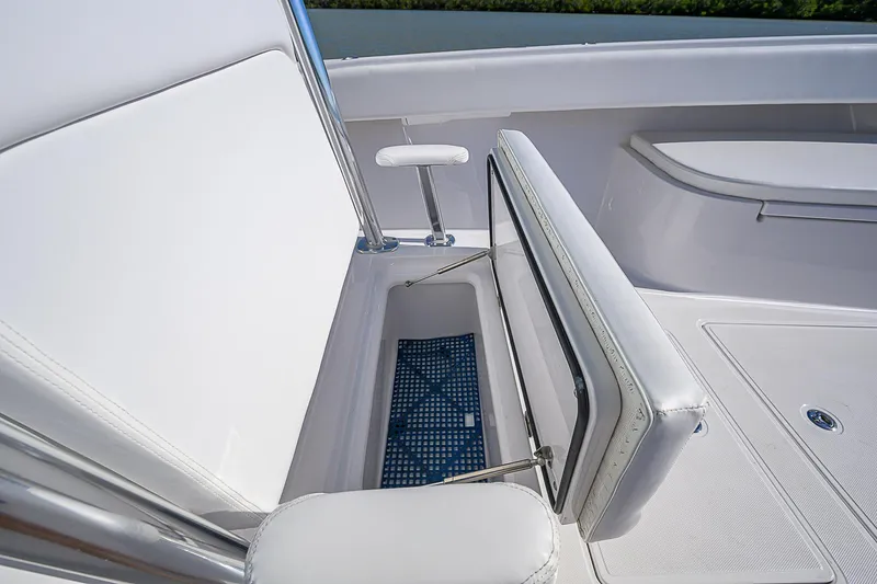 Grand Slam Yacht Photos Pics Open storage compartment on 2017 Bahama 41 boat with white seating.
