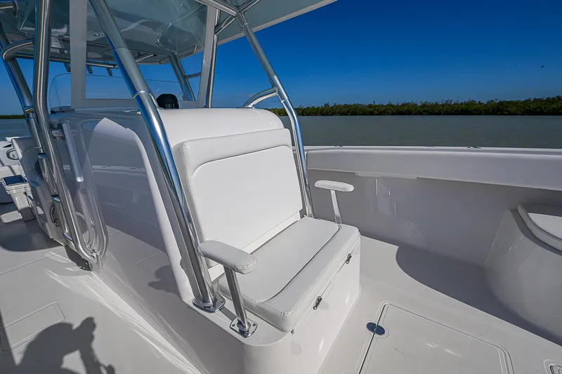 Grand Slam Yacht Photos Pics 2017 Bahama 41 boat interior with white seating and chrome accents.