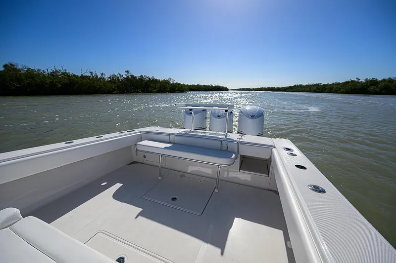 Grand Slam Yacht Photos Pics 2017 Bahama 41 boat on calm water, clear sky, spacious deck view.