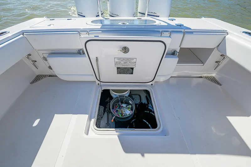 Grand Slam Yacht Photos Pics 2017 Bahama 41 boat deck with storage compartments and fishing gear.