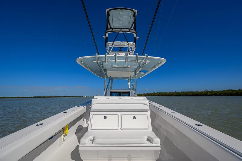 Grand Slam Yacht Photos Pics 2017 Bahama 41 boat on calm water under clear blue sky.