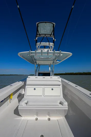 Grand Slam Yacht Photos Pics 2017 Bahama 41 boat with dual consoles and tower against clear blue sky.