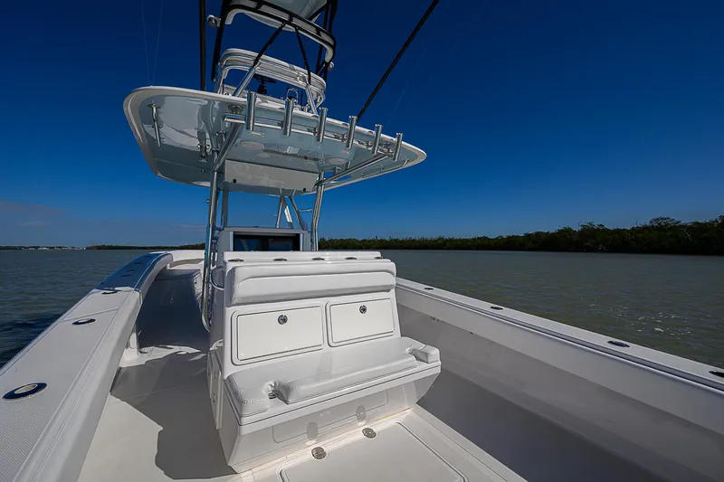 Grand Slam Yacht Photos Pics 2017 Bahama 41 boat with sleek design on calm waters under clear blue sky.