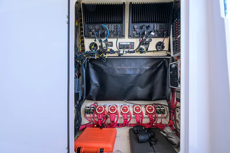Grand Slam Yacht Photos Pics Electrical panel inside a 2017 Bahama 41 boat, featuring wiring and equipment.