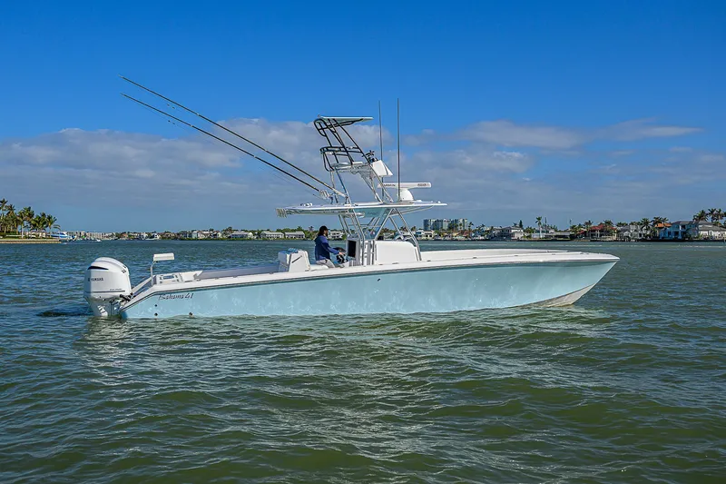 Grand Slam Yacht Photos Pics 2017 Bahama 41 boat cruising on a sunny day in calm waters.