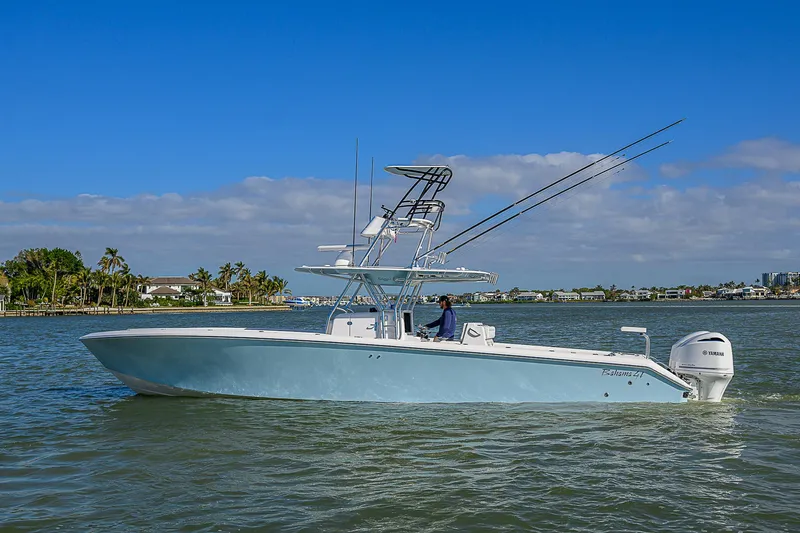 Grand Slam Yacht Photos Pics 2017 Bahama 41 boat cruising on a sunny day with clear blue skies.
