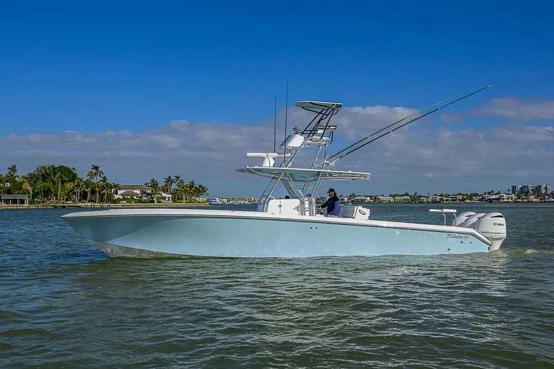 Grand Slam Yacht Photos Pics 2017 Bahama 41 boat cruising on a sunny day with clear blue skies.