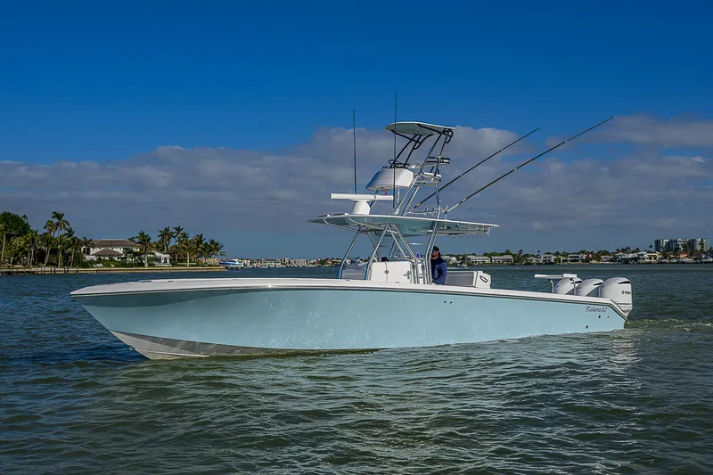 Grand Slam Yacht Photos Pics 2017 Bahama 41 boat cruising on calm waters under a clear blue sky.