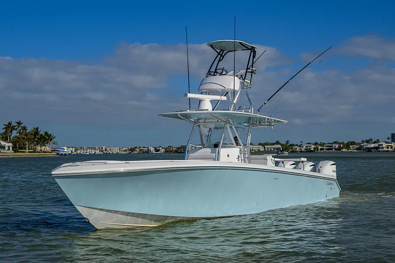 Grand Slam Yacht Photos Pics 2017 Bahama 41 boat cruising on calm waters under a clear blue sky.