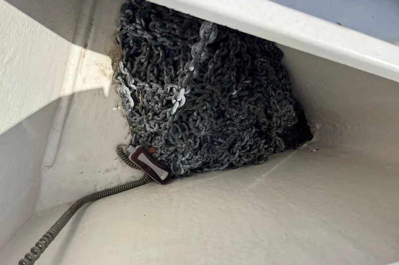  Yacht Photos Pics Anchor chain storage in a 2013 Beneteau Oceanis 45 sailboat compartment.