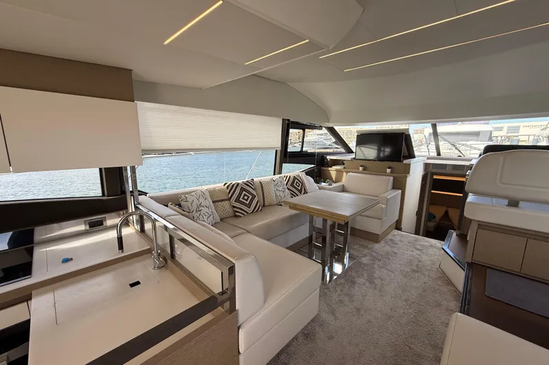  Yacht Photos Pics Luxurious interior of 2020 Prestige 520 yacht with modern seating and elegant design.