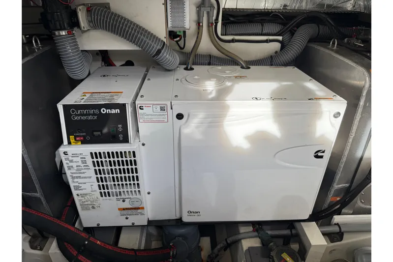  Yacht Photos Pics Cummins Onan generator in a 2020 Prestige 520 yacht engine room.