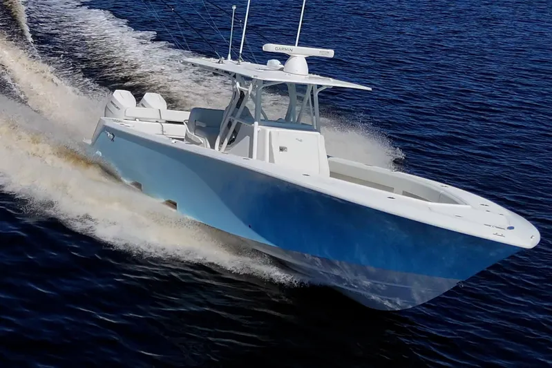 Da Bubbs Yacht Photos Pics 2024 SeaVee 322z boat cruising on open water, showcasing sleek design and performance.