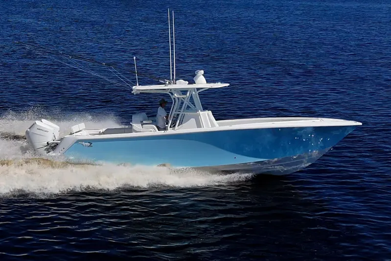 Da Bubbs Yacht Photos Pics 2024 SeaVee 322z boat cruising on open water, showcasing sleek design and performance.