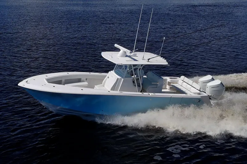 Da Bubbs Yacht Photos Pics 2024 SeaVee 322z boat cruising on open water, showcasing sleek design and powerful engines.