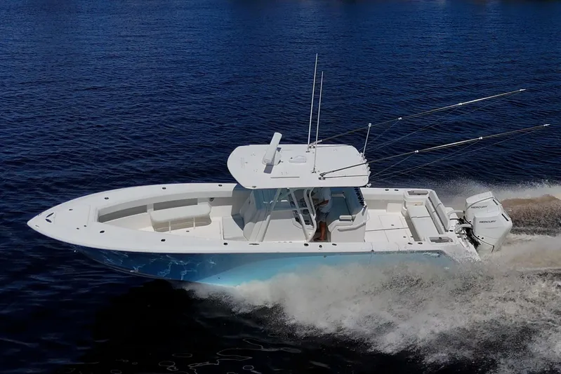 Da Bubbs Yacht Photos Pics 2024 SeaVee 322z boat cruising on open water, featuring dual Mercury engines.
