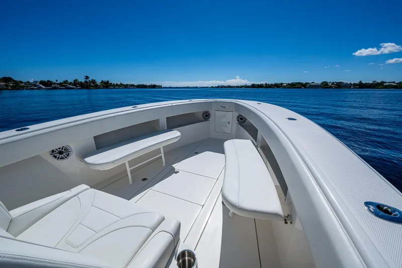Da Bubbs Yacht Photos Pics 2024 SeaVee 322z boat interior with white seating, on a calm blue ocean.