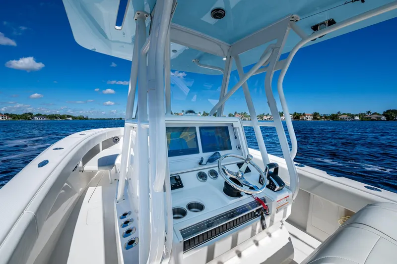 Da Bubbs Yacht Photos Pics 2024 SeaVee 322z boat interior with modern dashboard on a sunny day.