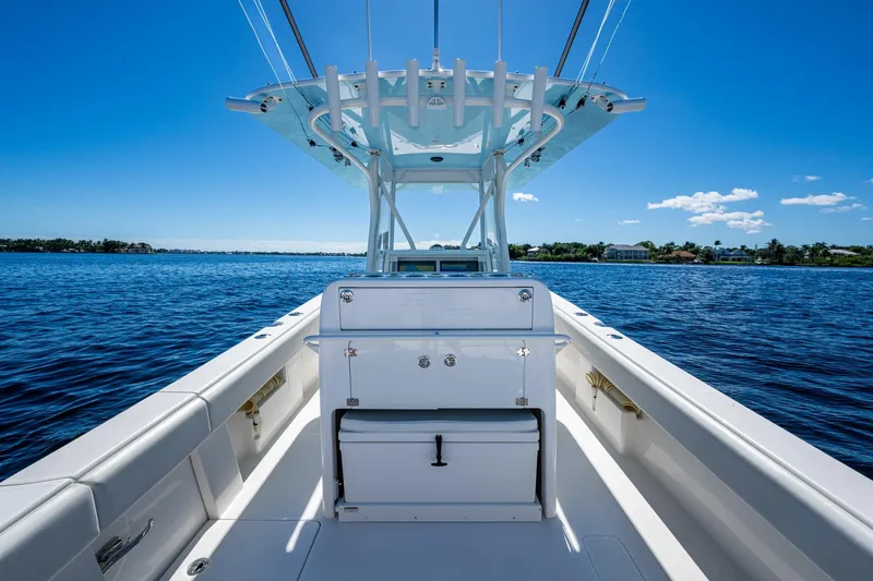 Da Bubbs Yacht Photos Pics 2024 SeaVee 322z boat on calm blue water under clear sky.