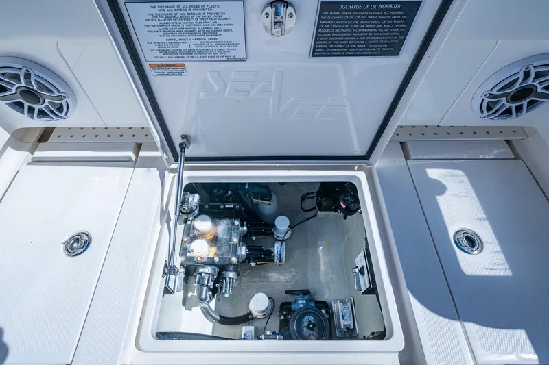 Da Bubbs Yacht Photos Pics 2024 SeaVee 322z boat compartment with mechanical components and speakers.