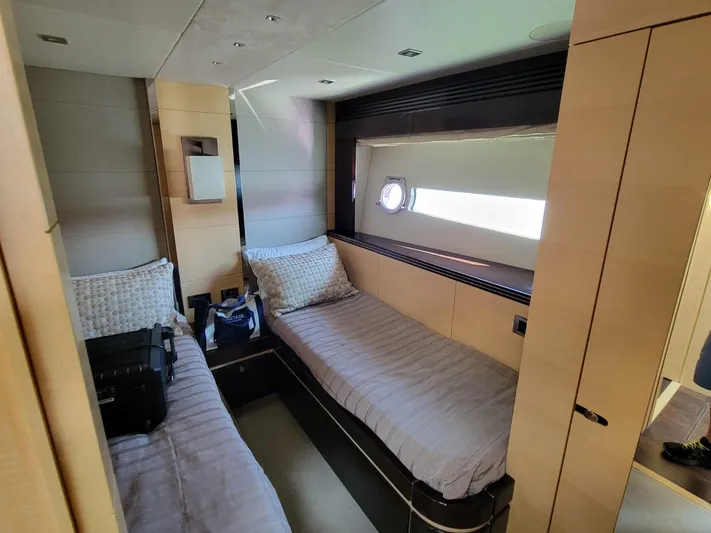  Yacht Photos Pics Interior cabin of 2014 Sunseeker 68 Predator yacht with twin beds.