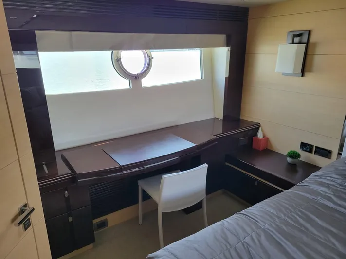  Yacht Photos Pics Sunseeker 68 Predator 2014 yacht interior with desk, chair, and porthole window.