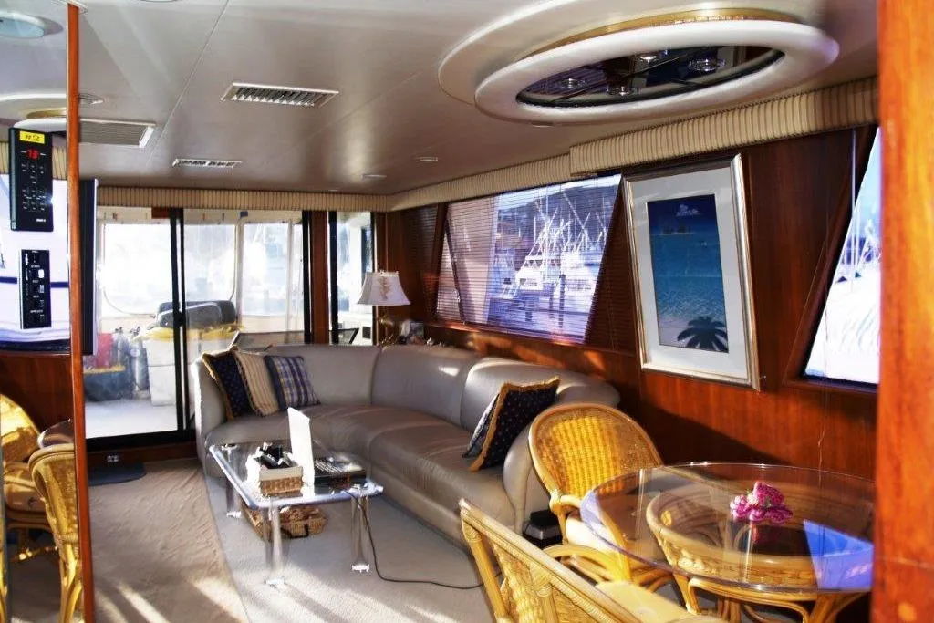 Luxurious interior of a 1991 Viking 65 Cockpit yacht with elegant seating and decor.