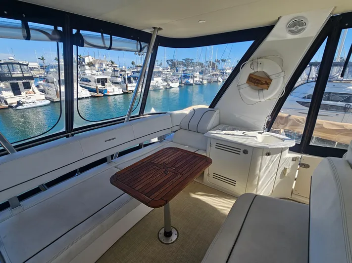 Captain's Quarters Yacht Photos Pics Luxurious 2012 Silverton West Coast Edition yacht interior with marina view.