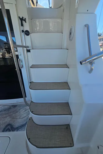 Captain's Quarters Yacht Photos Pics Staircase on 2012 Silverton West Coast Edition yacht, featuring sleek design and modern materials.