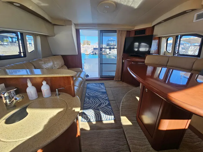 Captain's Quarters Yacht Photos Pics Luxurious 2012 Silverton West Coast Edition yacht interior with leather seating and modern amenities.