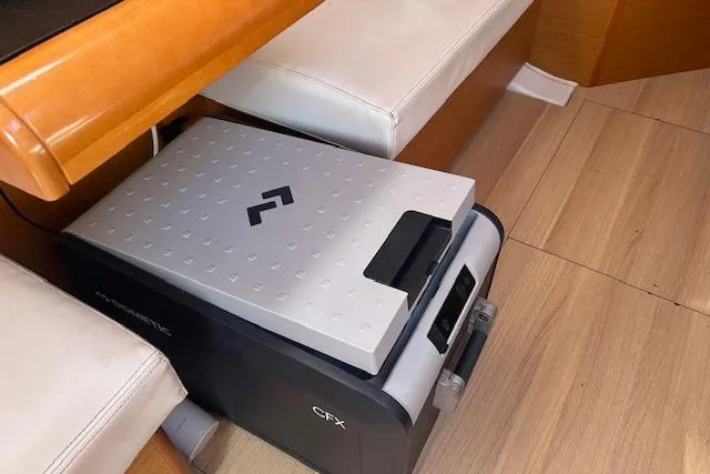 Urkab Yacht Photos Pics Compact refrigerator in 2018 Jeanneau Sun Odyssey 449 yacht interior.