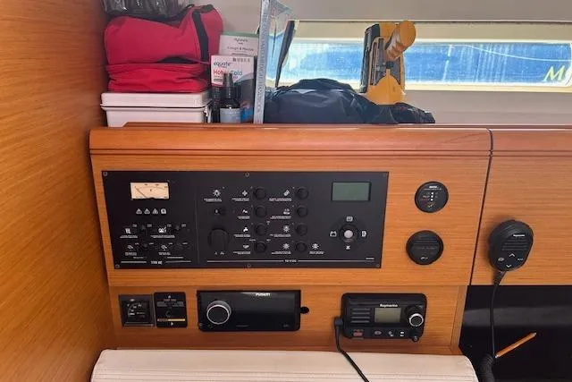 Urkab Yacht Photos Pics Control panel of 2018 Jeanneau Sun Odyssey 449 sailboat with navigation and communication equipment.